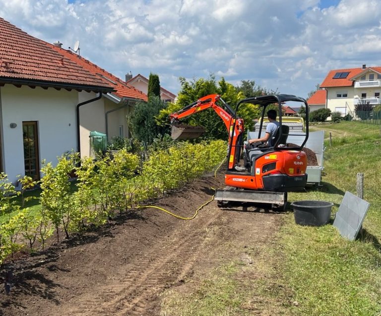 Beispielfoto von Personen bei der Anlage von Staudenbeeten und eines Fundaments